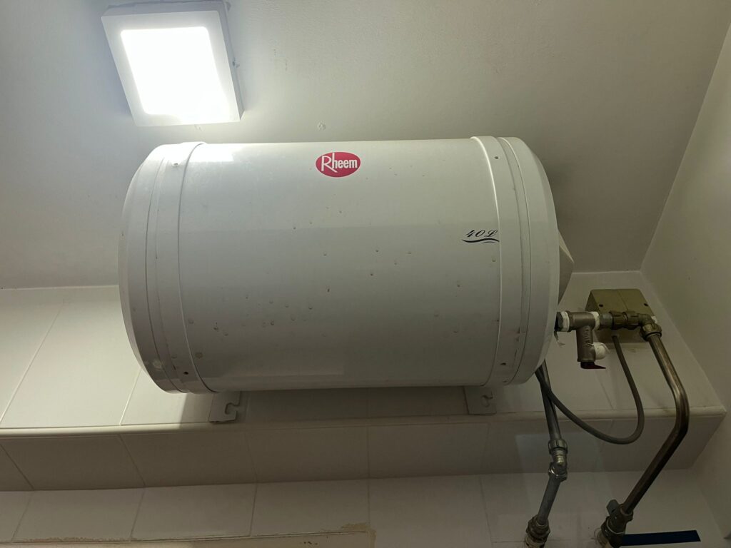 fix rheem water heater water leaking issue by fixinguru singapore